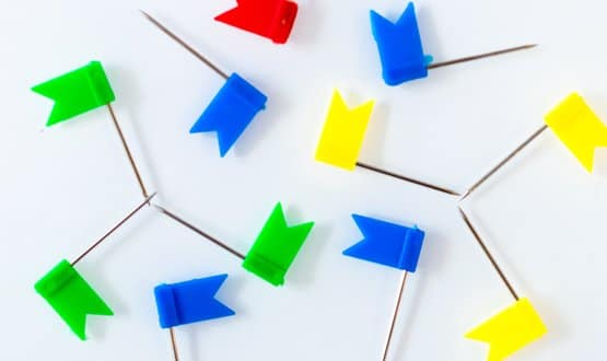 Coloured pin flags arranged in patterns