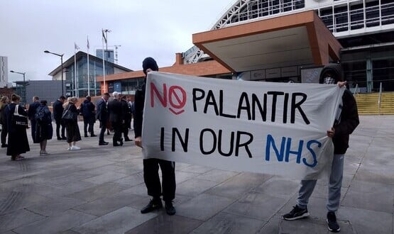 Campaigners protest against Palantir at NHS Confed Expo